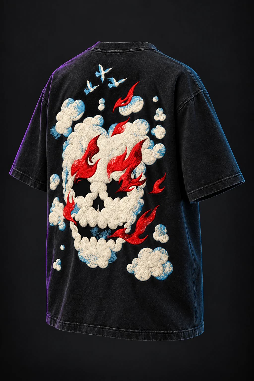 Three-quarter back view of the Pyre Wraith tee showing the smoke-skull embroidery